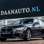 BMW 320i High Executive M-Sport grijs occasion kopen te koop 3 serie sedan Amsterdam heemskerk Haarlem beverwijk